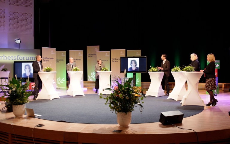 European Union University Sustainability Forum 2021. People on stage in Aula Magna . Photo: Jens Lasthein