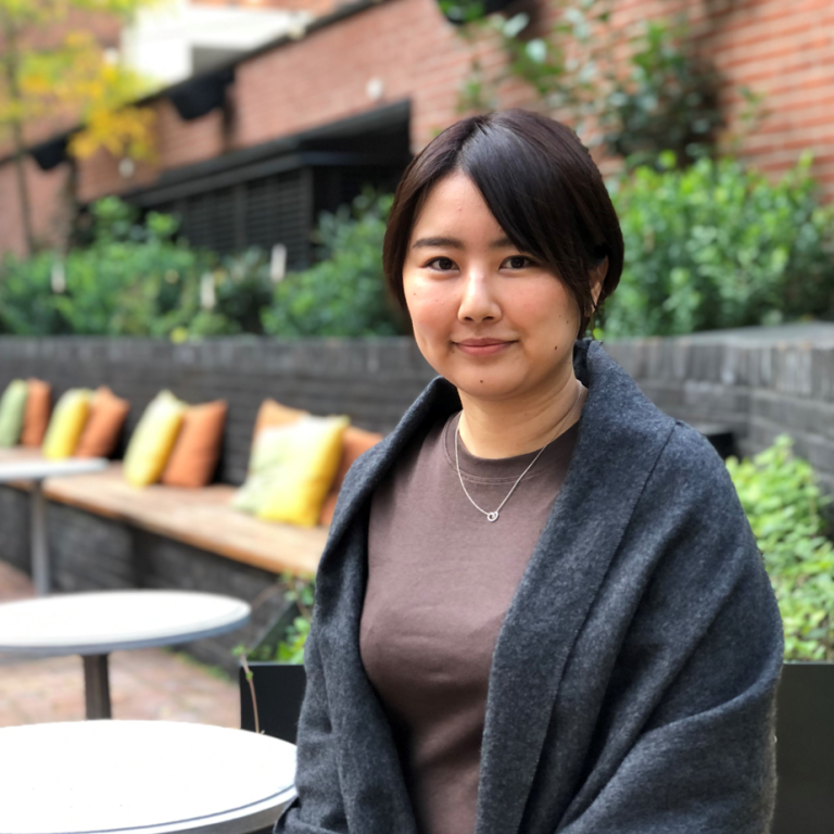 Ai Kuno sitting at a café