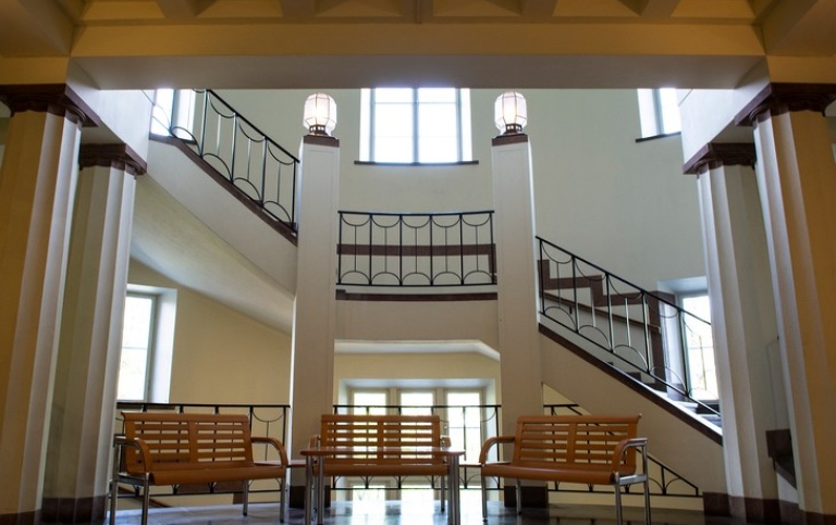 A staircase in an old beautiful building.